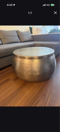 $125  (OBO) - World Market Cala Round Silver Hammered Metal Storage Coffee Table
