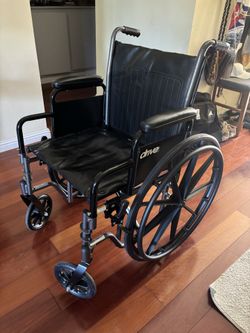 Drive Medical Silver Sport 2 Wheelchair with Detachable Full Arms and Swing away Footrests, 16" Seat