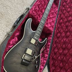 Schecter Hellraiser Extreme FR-E Satin Black Finish with Coffin Case