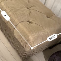 Vintage tufted Ottoman On Rolling Casters