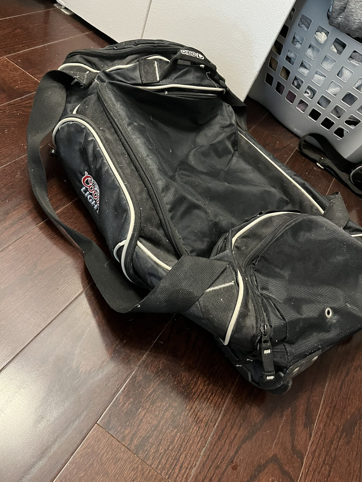 Black Ogio Wheeled Travel Bag With Handle