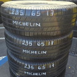 4 USED TIRES  235/65R17 MICHELIN DEFENDER w/90% Thread All 4 Installed $320
