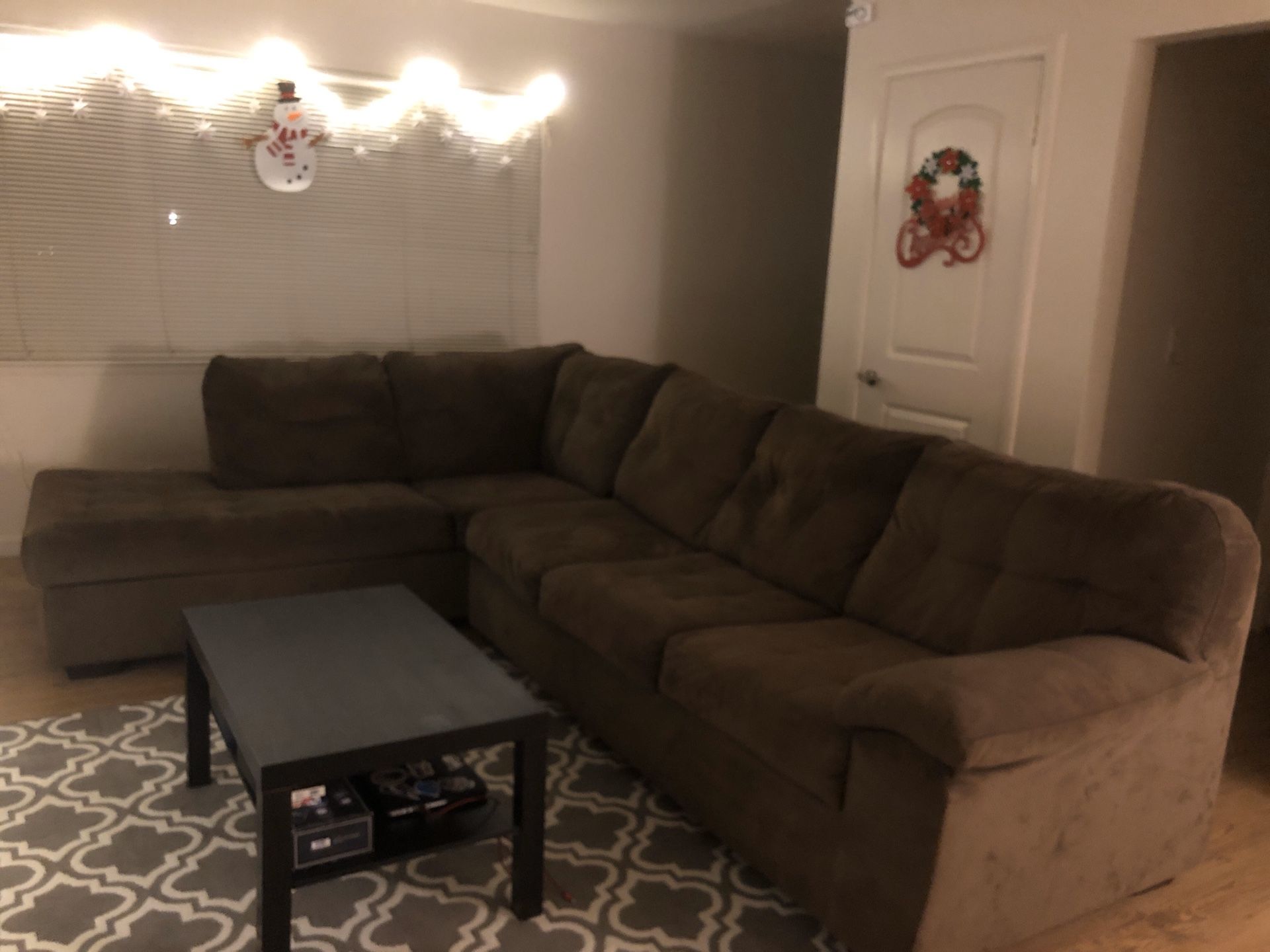 LARGE brown L-Couch for $120. Must pick up.