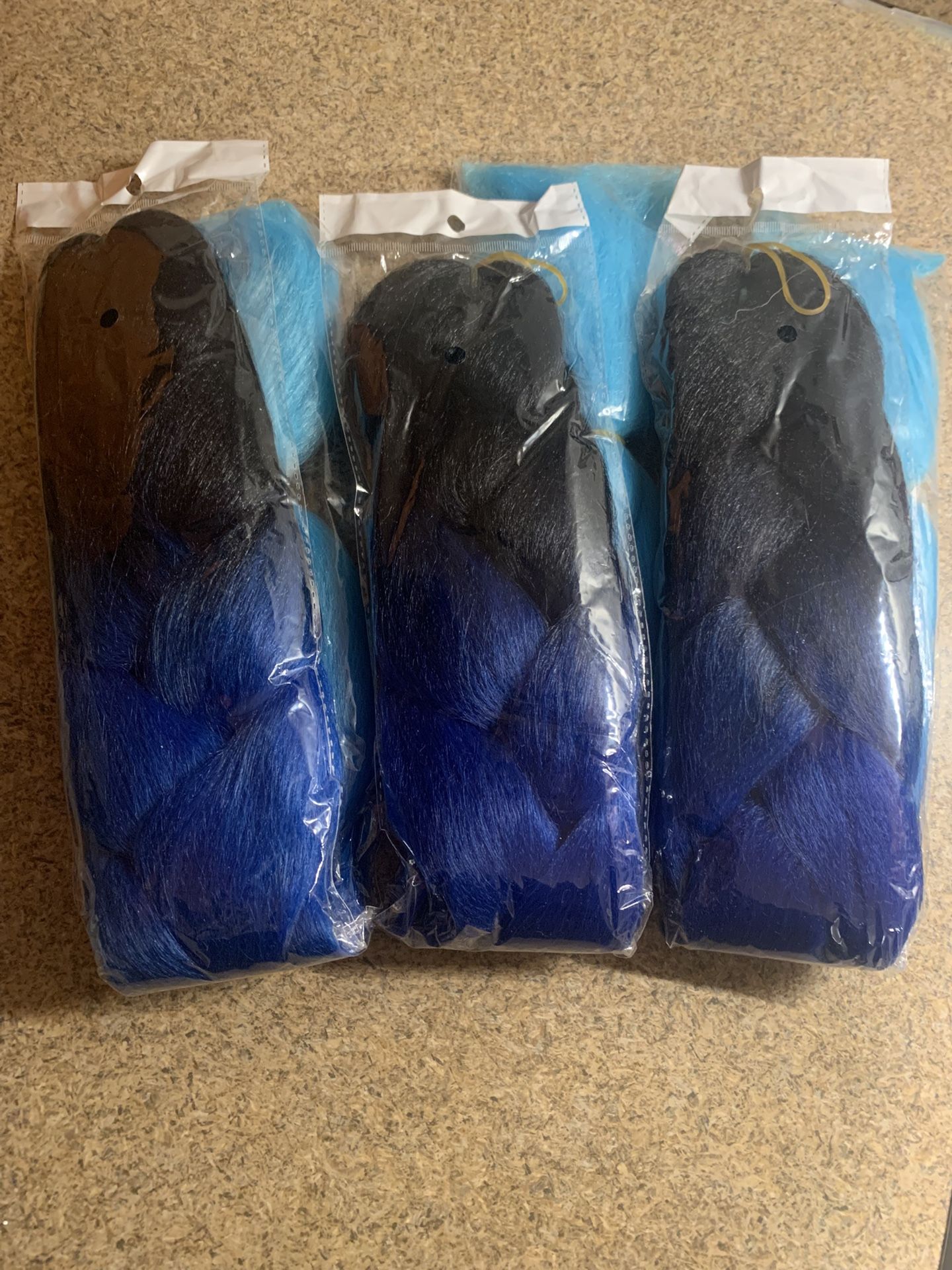 3 Brand new packs of black to teal synthetic kanekalon hair