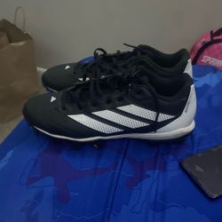 football cleats , black and white size 9 , adidas