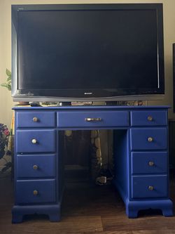 TV 55”, SHARP plus desk/ tv Stand..$45- for both