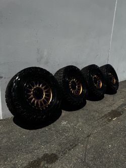 KMC KM552 IMS 8x6.5 20” Wheels Bronze with 35” Toyo Open Country AT3 All-Terrain Tires