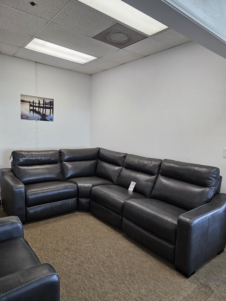Leather Sectional w/ 3 power recliners & headrests - Gabrine 