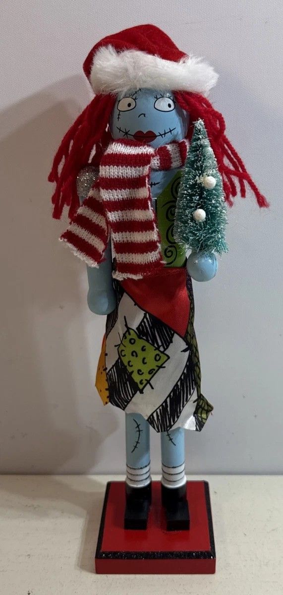 Disney Nightmare Before Christmas Nutcracker / Santa Hat Sally Holding Present