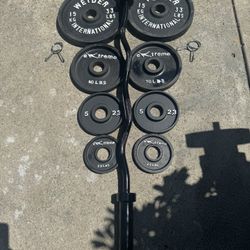 Olympic Weight Set + Bar =100 Lbs