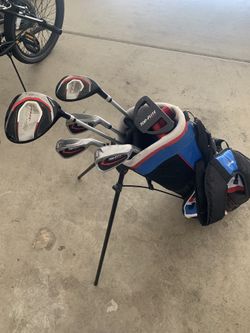 Golf Clubs And Bag (Juniors. Top Flite)