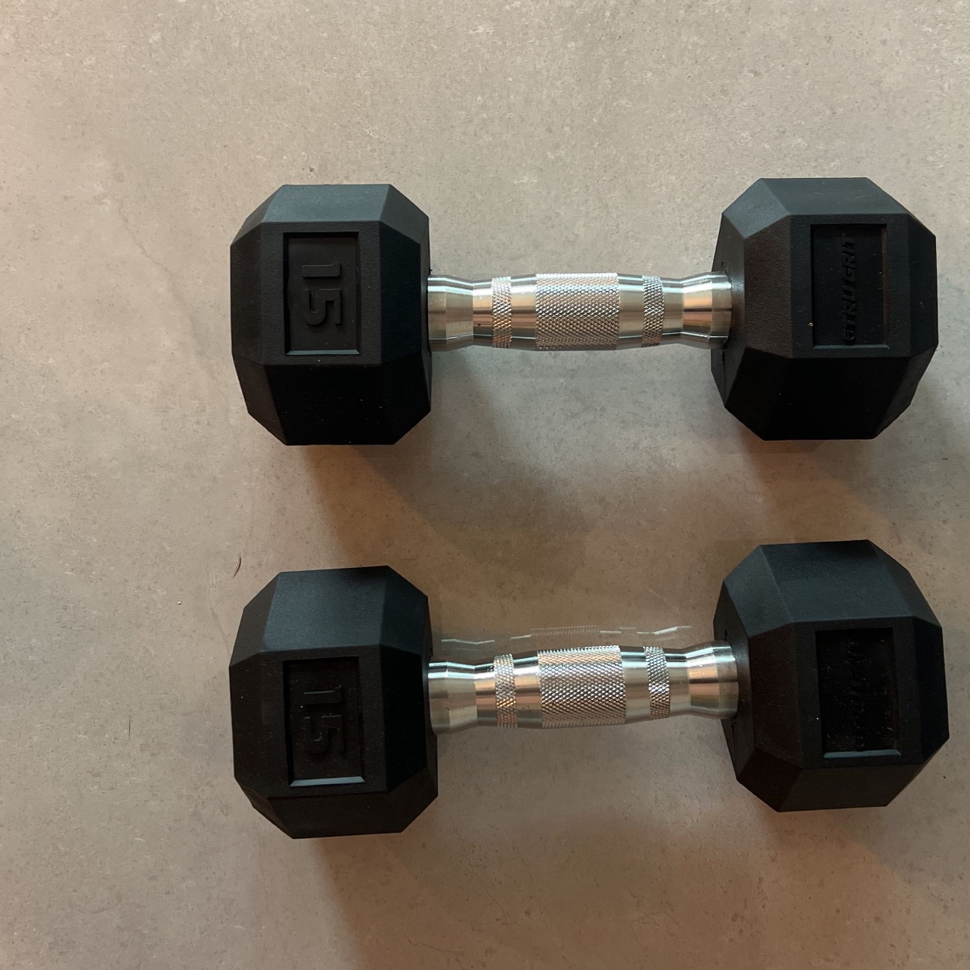 two 15 Pound Rubber Dumbells