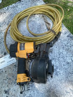 Shingle gun, and 50 foot hose in good condition, used for 4 months 130 both