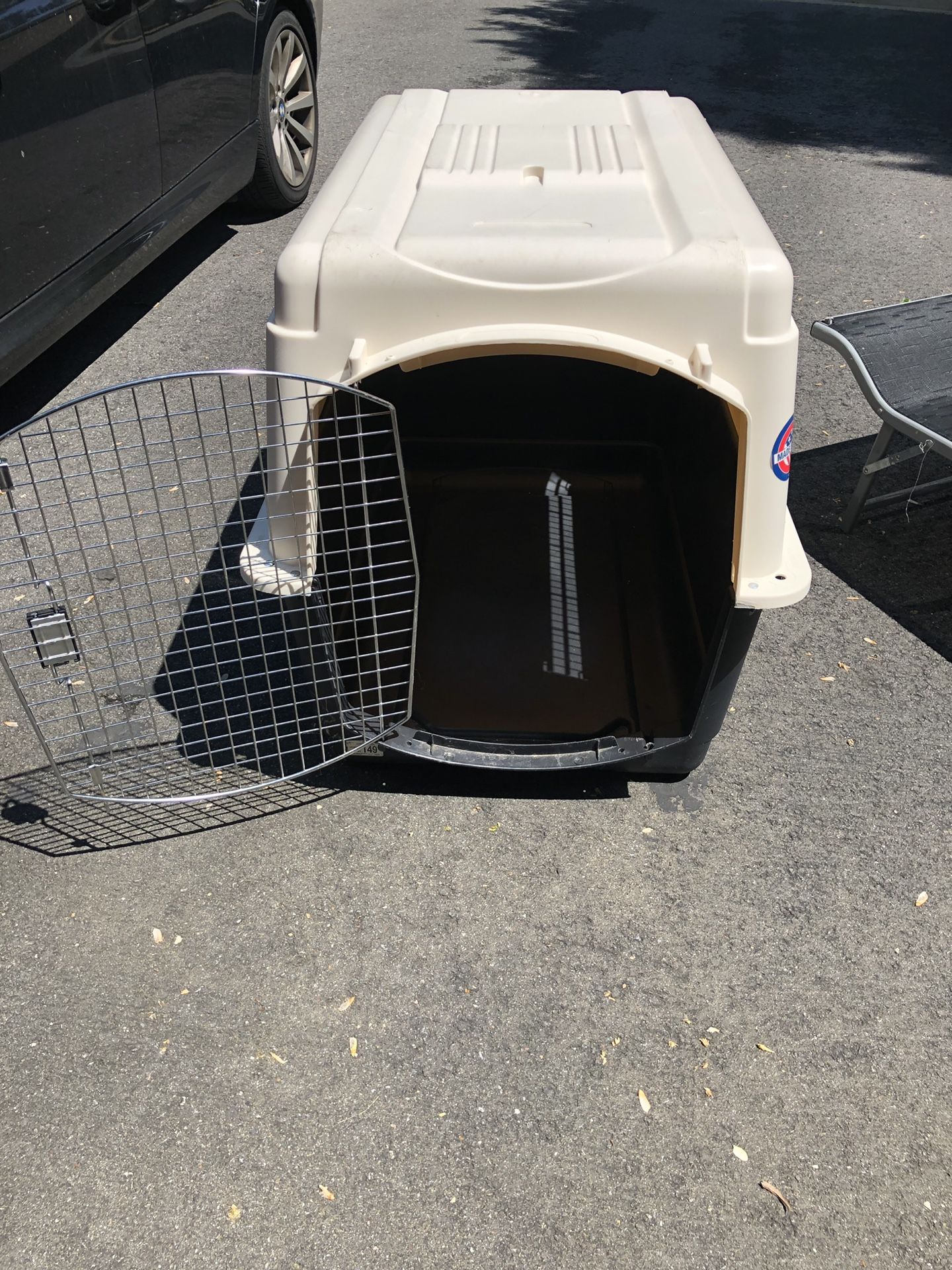 Large dog crate and raised bed