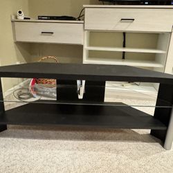 TV Stand With One Glass Shelf In The Middle