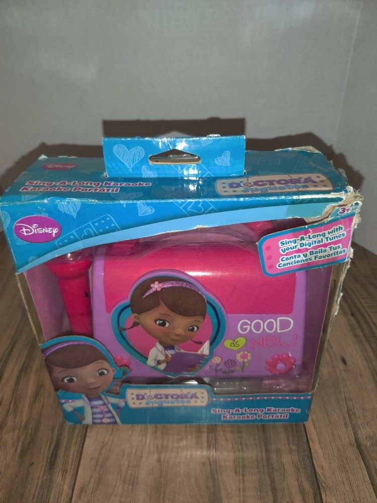 Disney Doctora Jugetes Sing Along Karaoke 2014 Sakar. Packaging has some damage and wear from age and storage. Sold as is.