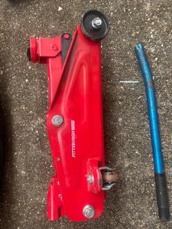 car jack with  4way tire tool like new