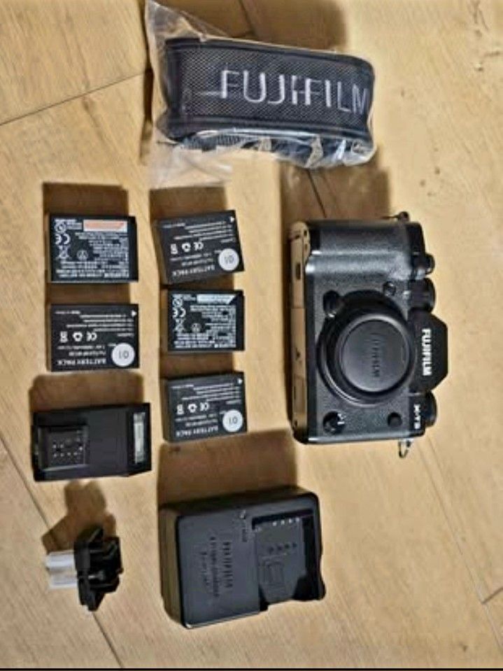 Fuji X-T3 Mirrorless Camera ($950) & Fuji 18-55mm f/2.8-4 Lens ($430)
