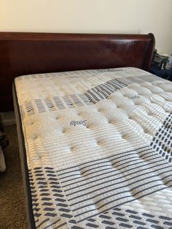 Six month old Sealy mattress with frame headboard
