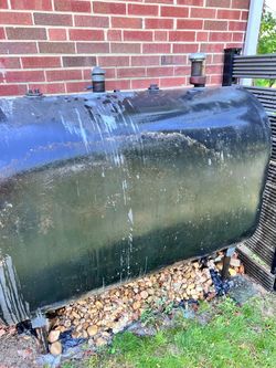 250gallon oil tank with oil