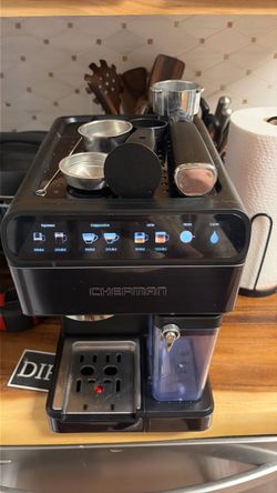 Espresso machine with milk frother