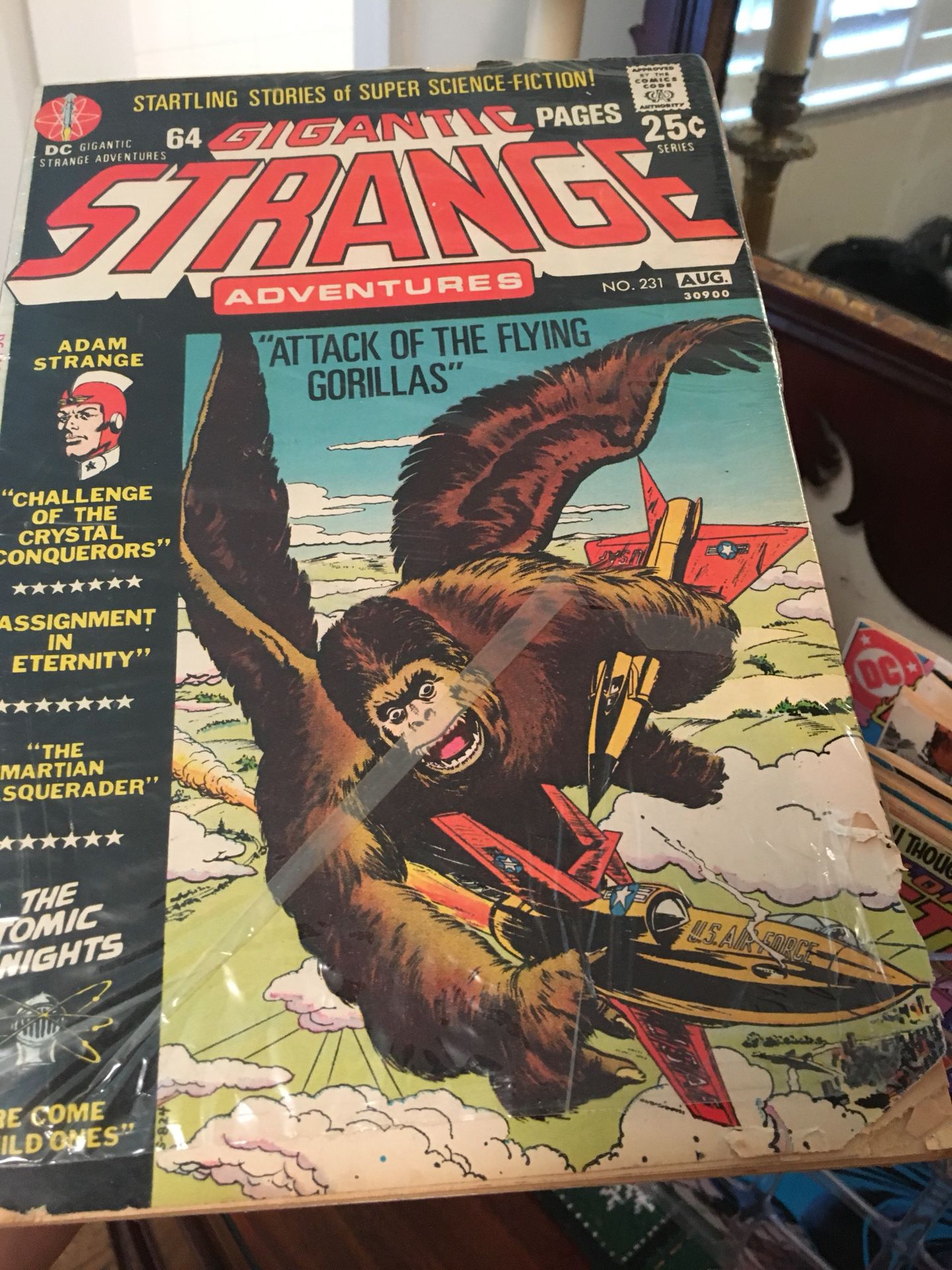 Gigantic Strange Comic-good used condition behind plastic covering with small tear in corner (see pics)