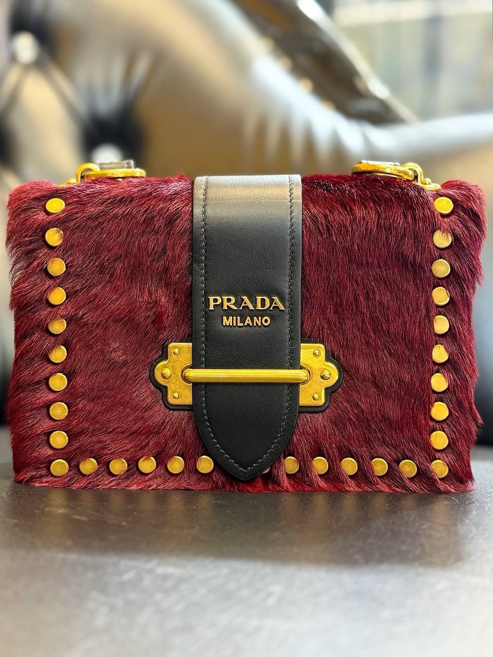 PRADA Cahier hair city pony-style calfskin faux fur crossbody bag granato black