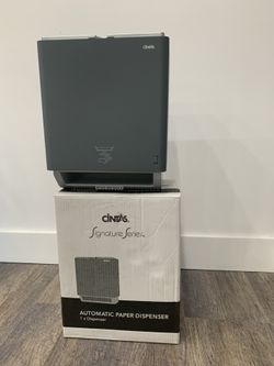 Automatic paper towel dispenser.