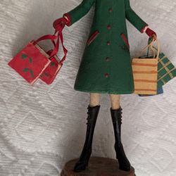 NEW Cute Girl Statue With Lots Of Shopping Bags. On The Bottom it says "Dashing Through The Dough". Great Christmas Gift Idea For Wife Or Teenager. St