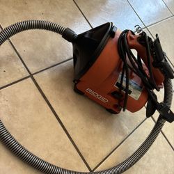 Drain cleaning tool has a CSA approved single phase motor rotating the MAXCORE cable at 450 RPM and foot bulb activation for ON/OFF AUTOFEED control k