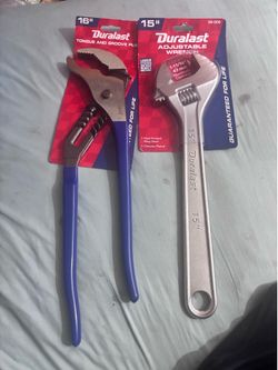 Large pliers and large adjustable wrench