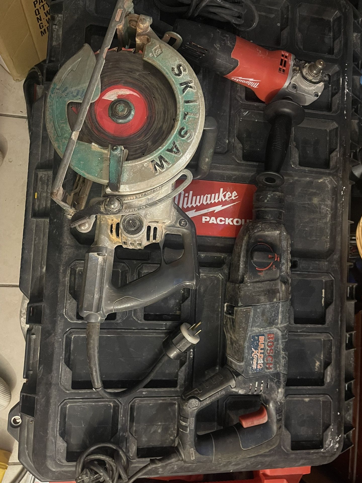 SKIL 15 amps 7-1/4 in. Corded Worm Drive Circular Saw, Boss Bulldog Rotary Hammer Drill. And Milwaukee Cord Grinder