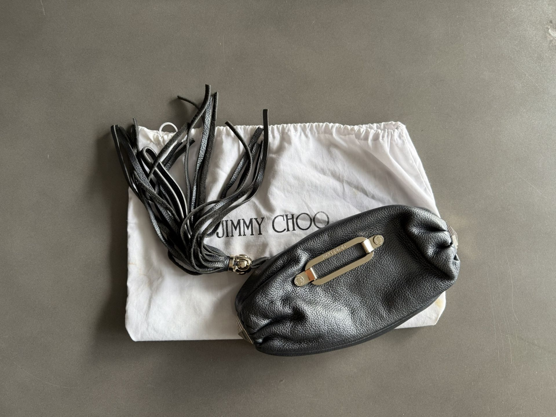 Jimmy Choo metallic Gray leather Wristlet With Tassel Vintage