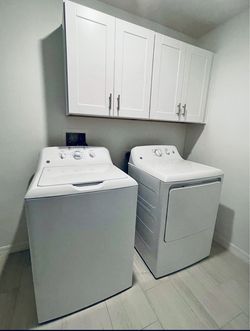One Year Old Washer And Electric Dryer 