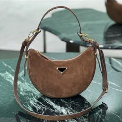 Prada Arqué suede shoulder bag 