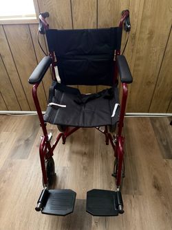 Medline Lightweight Foldable Transport Wheelchair with Handbrakes and 12-Inch Wheels