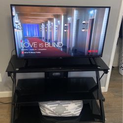 Black glass and chrome TV stand