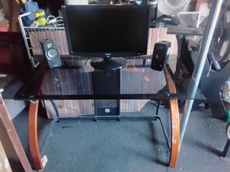 Desk with Monitor and speakers