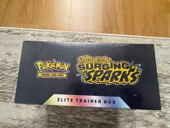 Surging sparks etb w/ small tear on top