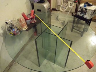 Glass table in glass stand