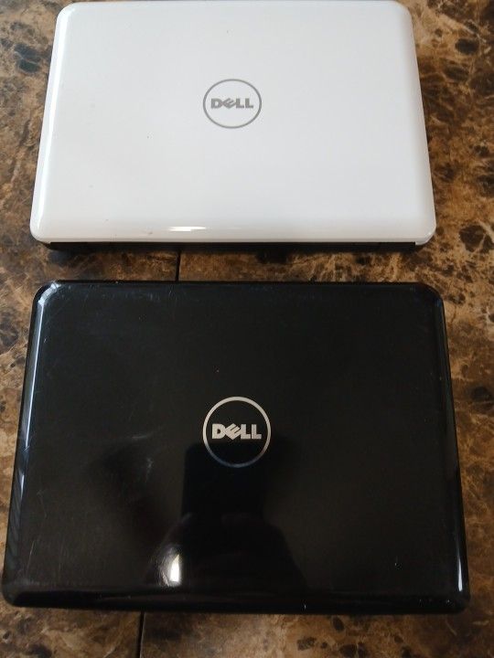 Dell Mini Inspiron 910: 9" glossy, - No CHARGER Untested
This is a Dell Inspiron Mini 910 netbook with an Intel Atom N270 processor, 1GB RAM, and a 1