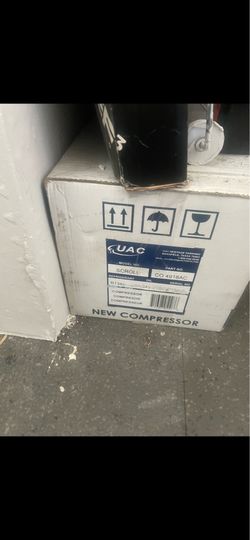 New UAC scroll compressor part number CO 4918AC. This unit is compatible with R134a refrigerant and PAG46 oil. The item is housed in its original whit