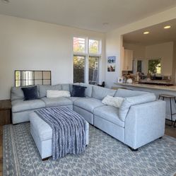 Light Grey Sectional With Ottoman