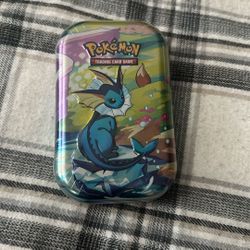 prismatic evolutions mini tin vaporeon 