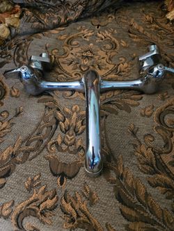 2 Glacier Bay Chrome two handle wall.mounted kitchen faucets