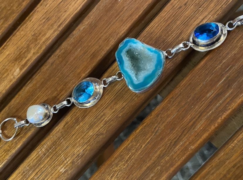 Several Stamped Silver And Geode Slice Bracelets Available 