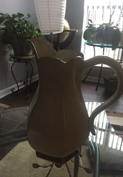 Antique pitcher ivory color