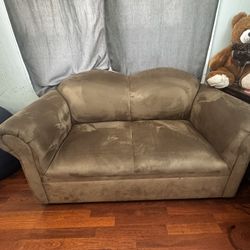 Brown loveseat Couch
