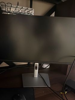 2 Dell P2422H monitors with Logitech keyboard and mouse