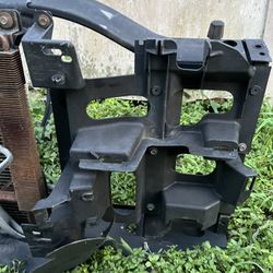 silverado cat eye headlight bracket